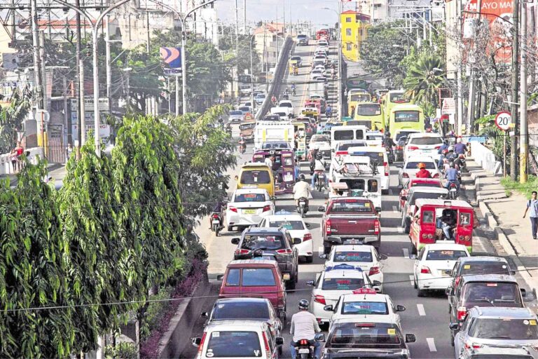 Aerial view of Cebu City showing major roadways and traffic flow improvements