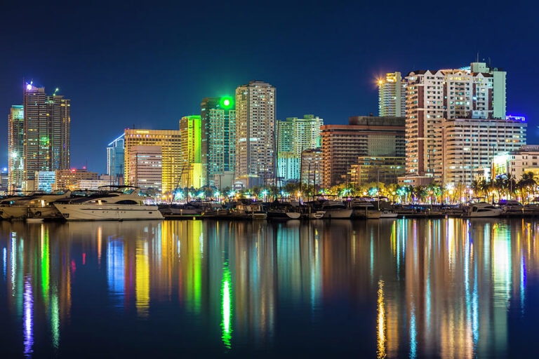 Manila skyline and city lights viewed from above at night